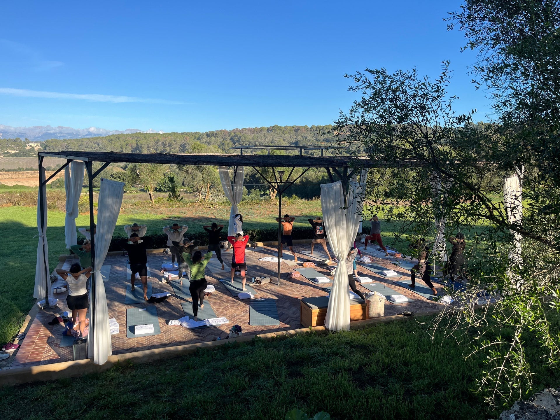 Taking yoga classes in the outside, resetting your vibes.